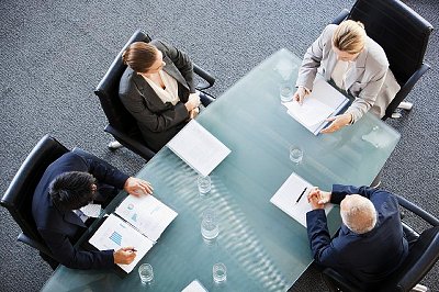 Business people meeting at table in conference room